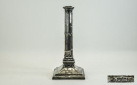 Victorian Silver Candlestick with Panel Column on Swept Square Base.