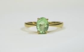 18ct Yellow Gold Single Stone Emerald Ring. Marked 18ct. The Emerald of Pale Colour.