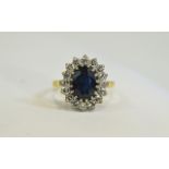 18ct Gold Set Sapphire and Diamond Cluster Ring.