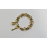 A Top Quality Ladies 9ct Gold Fancy Gate Bracelet with Attached 9ct Gold Charm,