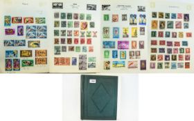 Green springback stamp album with strength in USA, India, Nigeria,