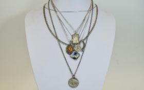 A Good Selection and Variety of Silver Pendants with Attached Silver Chains ( 8 ) In Total.