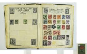 An old battered A5 Victory stamp album f