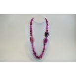 A Nice Quality Polished Pink Agate Necklace with Silver Clasp.