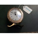 Swiza Small Oval Bedside Clock, gilt brass finish,