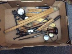 Box of Assorted Vintage Tools to include hacksaw and hammer. Along with approx 8 folding rulers.