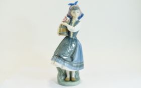 Lladro Figurine ' Budding Blossoms ' Young Dutch Girl with Barrel of Flowers. Model No 1416.