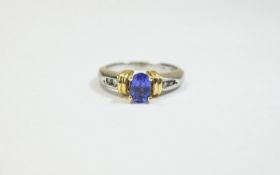 14ct White Gold Set Tanzanite and Diamond Ring, The Faceted Tanzanite of Good Colour. Marked 14ct.