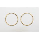 Ladies 9ct Gold Large Pair of Hoop Earrings. Marked 9ct. Each Hoop 1.25 Inches Diameter.