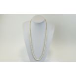 A Vintage Single Strand Cultured Pearl Necklace with Silver Clasp. Marked Silver.