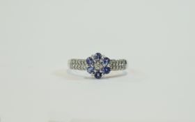 9ct Gold Tanzanite and Diamond Cluster Ring.