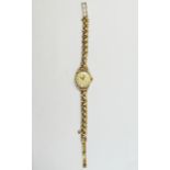 Omega - Ladies 9ct Gold Mechanical Wrist Watch with Attached 9ct Gold Diamond Cut Bracelet.