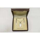 Silver Diamond Set Pendant Necklace and Earring Set.