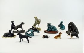 Collection of Animal Figures including Poole Pottery otter, dolphin and seal figures,