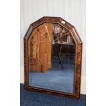 Contemporary Mirror Approx dimensions 22 x 33 inches, dark wood frame with floral detailing.