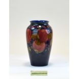 W. Moorcroft Vase ' Ochre Pomegranates ' Design. c.1920's. 8.5 Inches High.