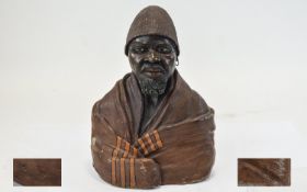 1950s Terracotta Sculpture. Cold painted bust in the form of an Arab with shawl.