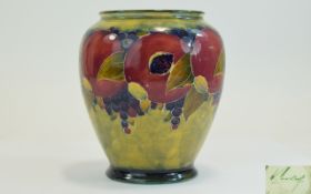 William Moorcroft Signed Vase ' Ochre ' Pomegranates Design. c.1914 - 1920.