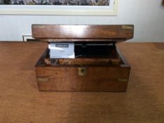 Walnut Writing Slope, brass hinge opens to reveal fitted interior compartment with tooled