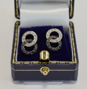 9 ct White Gold Black and White Diamond Earrings.