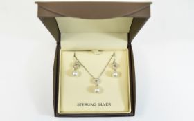 Silver Diamond Set Pendant Necklace and Earring Set.