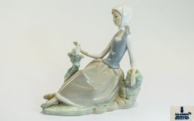 Lladro Porcelain Figurine ' Young Shepherdess ' Sitting with Dove. Model No 4660.