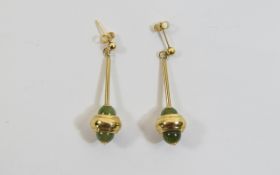 A Pair of 9ct Gold Set Jadeite Drop Earrings. Fully Hallmarked. Each Earring 1.25 Inches High.