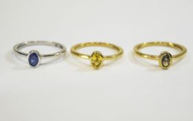 Green, Blue and Yellow Sapphire Triple Stacking Rings, three individual solitaire rings each bezel