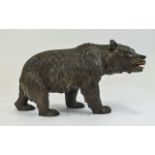 A Carved Black Forest Bear. 8.5 Inches In Length, Bead Eyes and Painted Mouth.