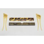 2 African Bone Hair Clips Together With A Chinese White Metal Comb Holder Showing Raised Images Of