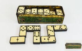Tinned Domino Game Small complete tin of 28 dominoes by EML CO, marked British made,
