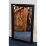 Dark Wood Framed Mirror Approx dimensions 25 x 40.