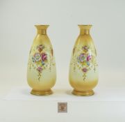 Pair of Fieldings Devonware 'Spring' Vases. 10 inches in height.