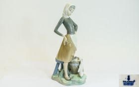 Lladro Porcelain Figurine ' Girl with Duck ' Drinking out of a Milk Pail. Model No 4682.