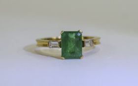 18ct Gold Set Single Stone Emerald Ring with Diamond Shoulders.