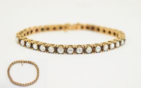 Antique Gold Diamond Tennis Bracelet set with 36 old round cut diamonds. Length 7 inches.