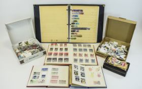 Mix of albums and boxes of mostly British stamps.