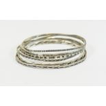 A Collection of Six Vintage Silver Bangles. All Fully Hallmarked.