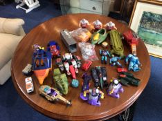 Box Containing A Quantity Of Vintage Transformer Figures, He-man Toys Etc.