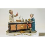 Capodimonte Large Figure Depicting chemist scene with Chemist at bench,