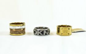 Michael Kors and DKNY Designer Rings (3) in total.