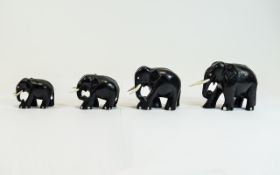 Elephant Family of Ebony and Bone Figure ( 4 ) In Total. c.