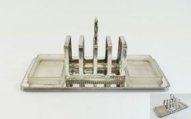 A Modern Silver Plated Combined 4 Tier Toast Rack and Butter Stand. 4.5 Inches High & 9.
