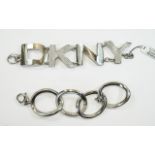 Two DKNY Designer Bracelets.