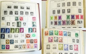 Very well populated New World Wide postage stamp album. Illustrated with many mint and used stamps.