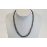 A Fine Quality Single Strand Black Pearl Cultured Necklace, with 18ct White Gold Clasp, Marked 750.