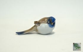 Small glazed Ceramic Bird Marked B&G to base, cream white and taupe glaze.