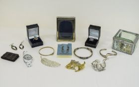 Mixed Lot of Costume Jewellery Housed in silver holographic cardboard box approx 10 items in total