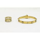 Michael Kors Designer Bangle and Ring. Gold tone buckle detail bracelet with raised stud design.