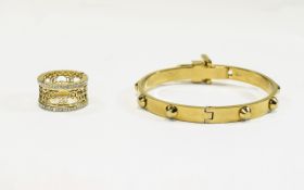 Michael Kors Designer Bangle and Ring. Gold tone buckle detail bracelet with raised stud design.